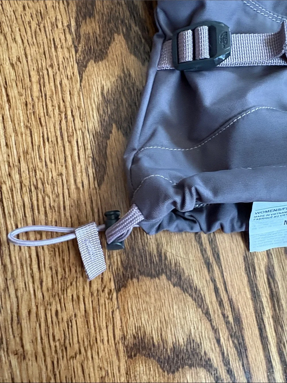 The North Face purple-grey women’s adjustable ski gloves. Excellent condition